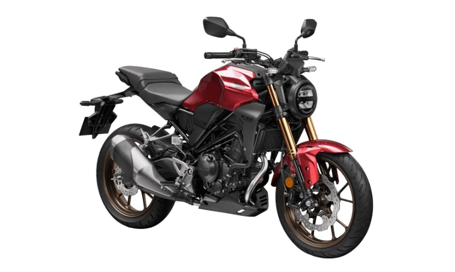 Honda CB250R warna merah Candy Chromosphere dengan rim emas, pandangan tiga suku hadapan dari kanan